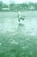 Photo of child falling on ice.