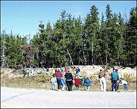 Off the buses and into the woods